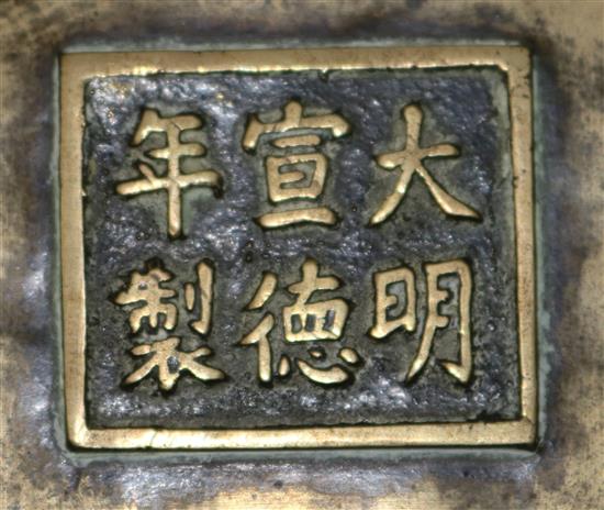 Two Chinese bronze censer stands, six character Xuande marks, 18th/19th century, diameter 16cm and 17cm